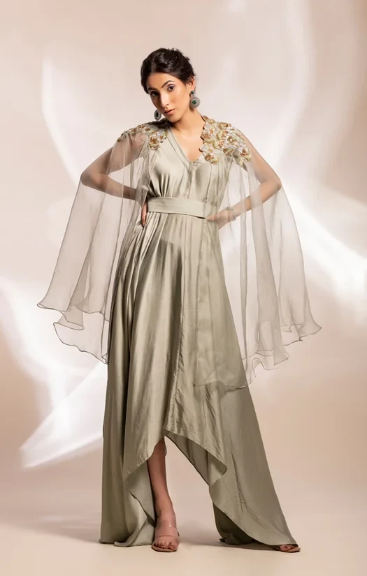 Drape dress worn with cape